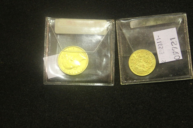 Appraisal: A VICTORIAN SOVEREIGN together with a Victorian half sovereign dated