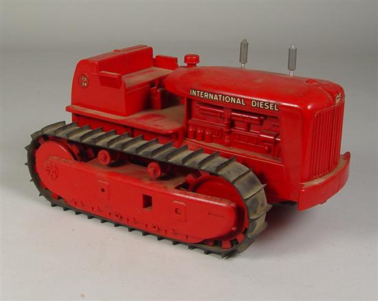 Appraisal: Product Miniature Company IH Crawler Toy Circa Plastic International Harvester