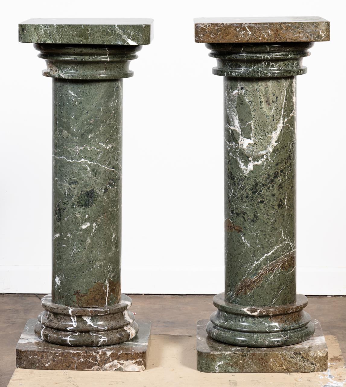 Appraisal: PAIR GREEN-BROWN MARBLE COLUMN FORM PEDESTALS Possibly Italian th century