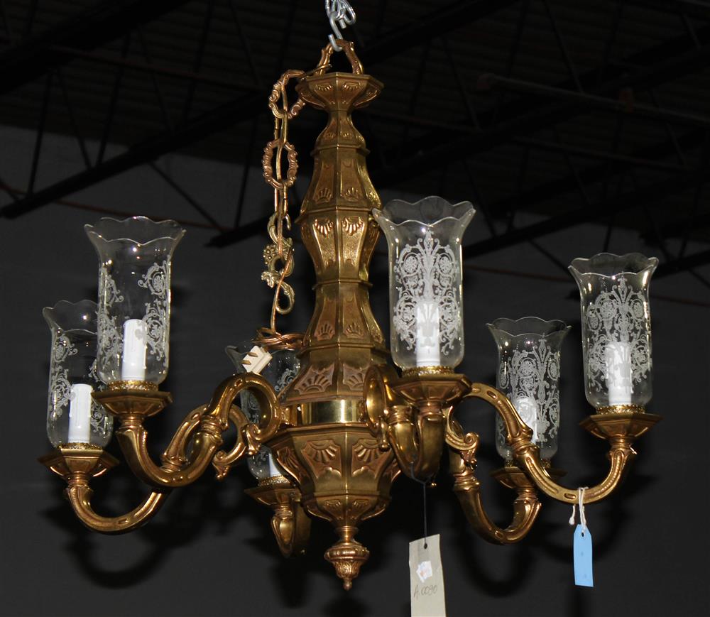 Appraisal: PAIR OF NEOCLASSICAL STYLE GILT BRASS SIX-LIGHT CHANDELIERS cast with