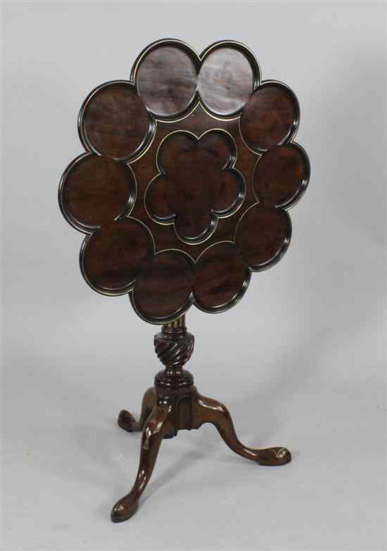 Appraisal: A George II mahogany and brass inlaid supper table in