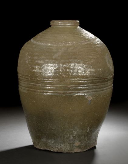 Appraisal: Southeast Asian Glazed Storage Jar th century the tapered stoneware