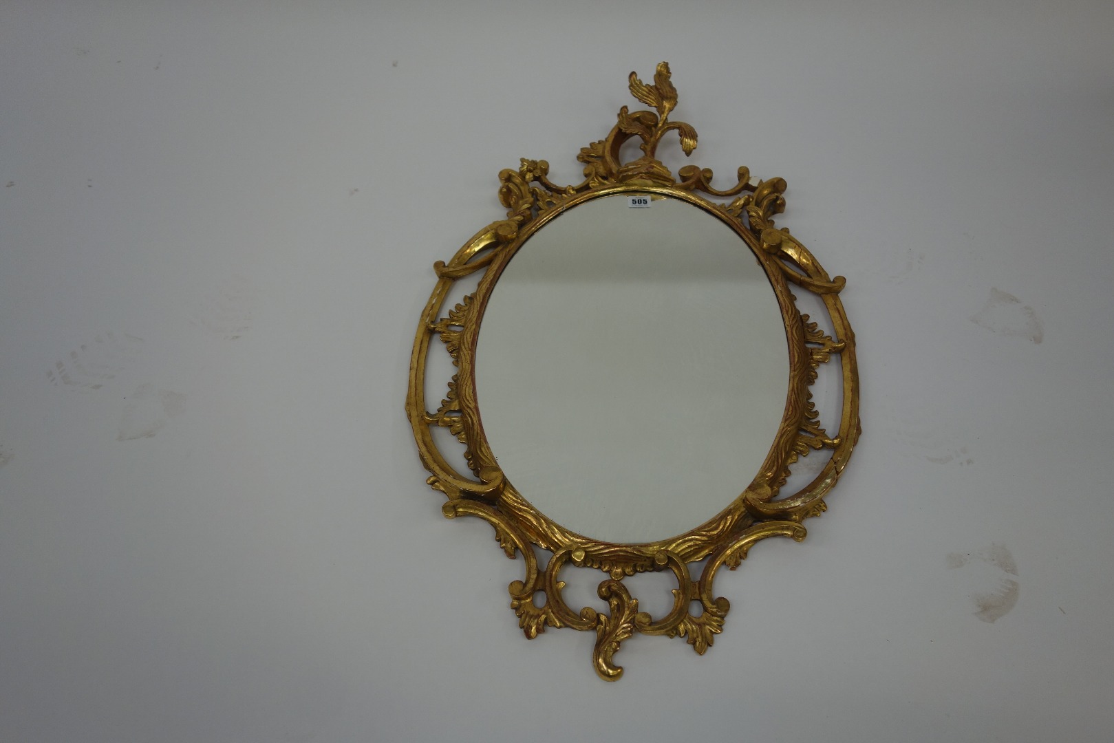 Appraisal: A mid th century style oval giltwood frame wall mirror