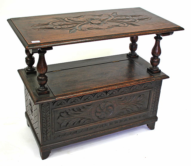 Appraisal: AN OLD OAK MONKS BENCH with lifting lid to the