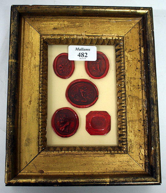 Appraisal: A GROUP OF FIVE WAX SEALS in a gilt frame