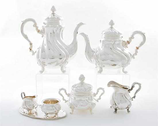 Appraisal: German silver tea and coffee service ornate pattern comprising coffeepot