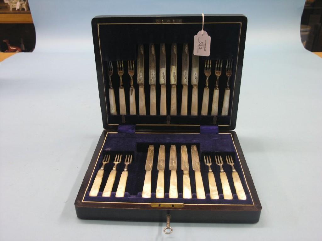 Appraisal: A cased part set of dessert knives and forks eleven