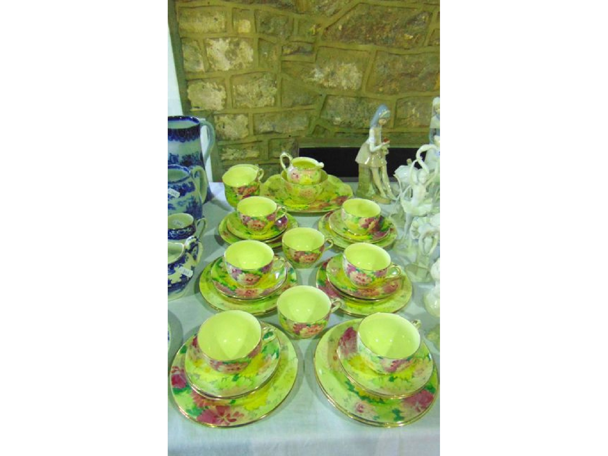 Appraisal: A collection of Crown Staffordshire yellow ground tea wares with