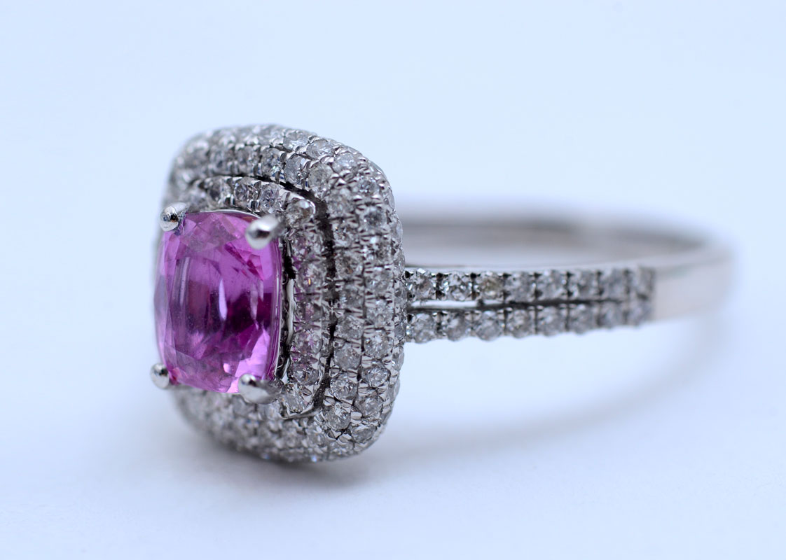 Appraisal: PLATINUM NO HEAT PINK SAPPHIRE AND DIAMOND RING Single cushion