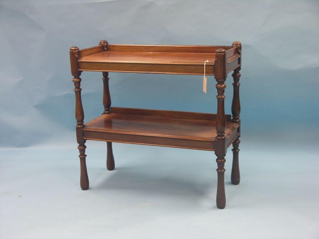 Appraisal: A Victorian mahogany open buffet two-tiered on baluster-turned supports ft