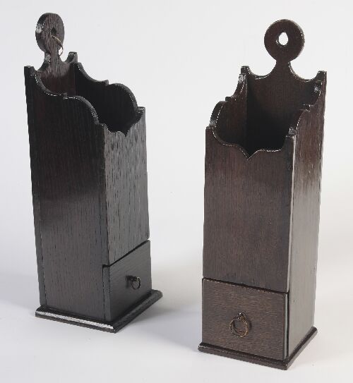 Appraisal: A matched pair of oak candle boxes each with circular