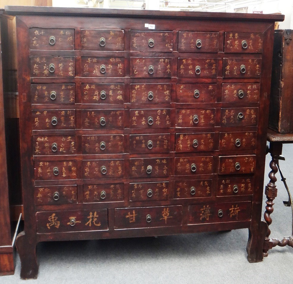 Appraisal: A large early th century Chinese softwood thirty eight drawer