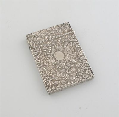 Appraisal: A Victorian card case embossed all over with scrolling flowers