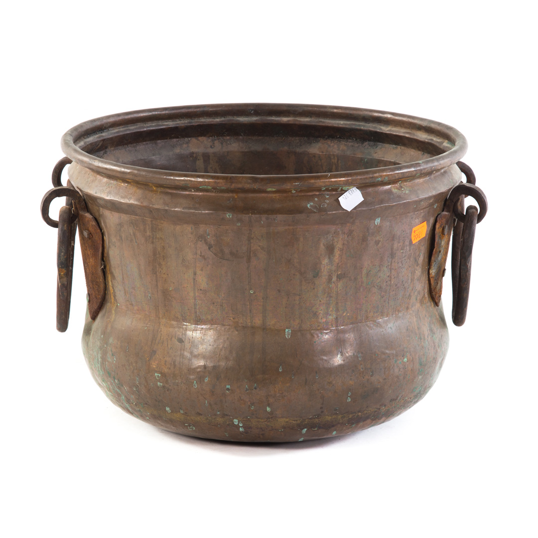 Appraisal: Copper pot with wrought iron bale handles in H in