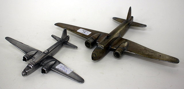 Appraisal: A WORLD WAR II BRASS MODEL AIRCRAFT cm wingspan together