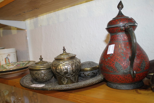 Appraisal: A COLLECTION OF INDO-PERSIAN BRASS WARE including silver metal inlaid