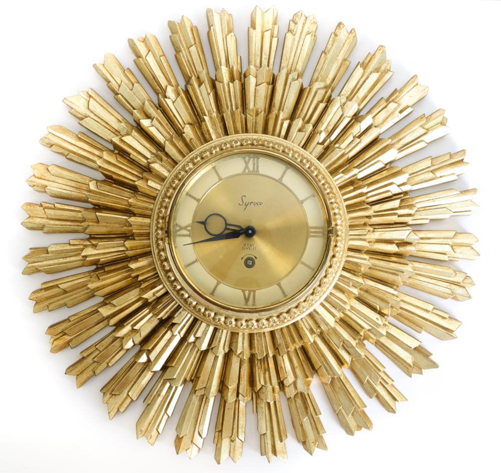 Appraisal: MID CENTURY MODERN SYROCO SUNBURST CLOCKMid-Century Modern starburst sunburst clock