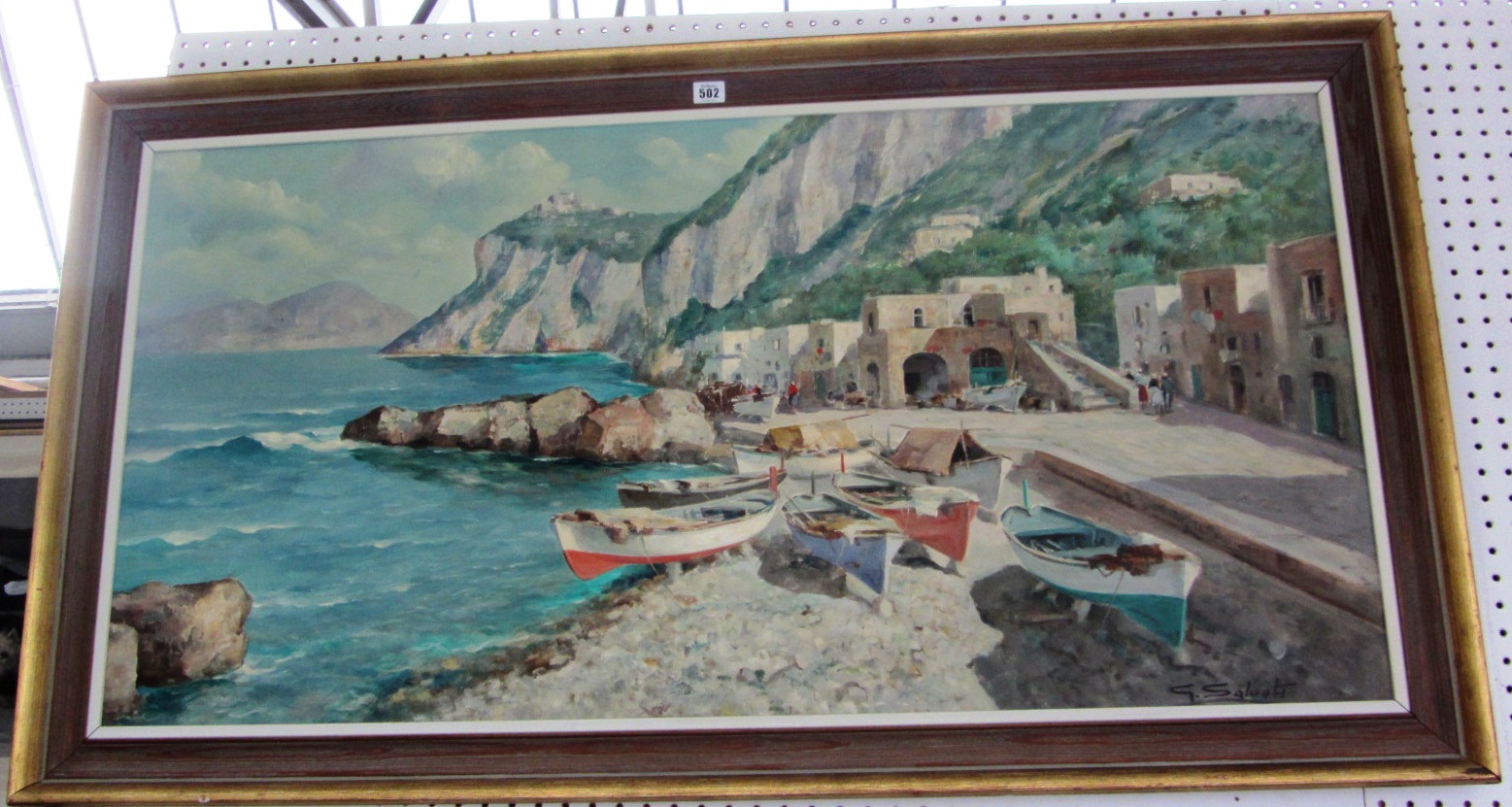 Appraisal: Giuseppe Salvati th century Beached boats in an Italian Bay