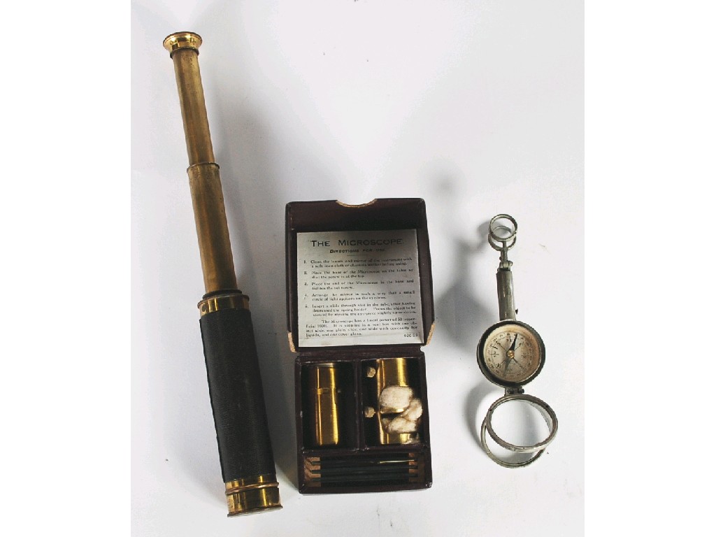 Appraisal: SIMPLE EARLY TWENTIETH CENTURY GILT BRASS MONOCULAR FIELD MICROSCOPE of