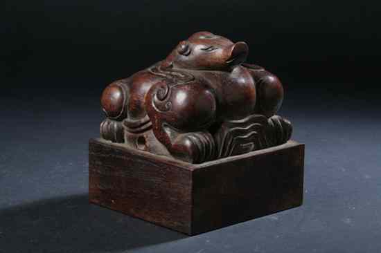 Appraisal: CHINESE HARDWOOD MYTHICAL ANIMAL SEAL - in high