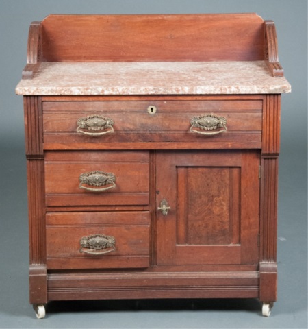 Appraisal: Victorian Marble Top Walnut Wash Stand Three drawers and cabinet