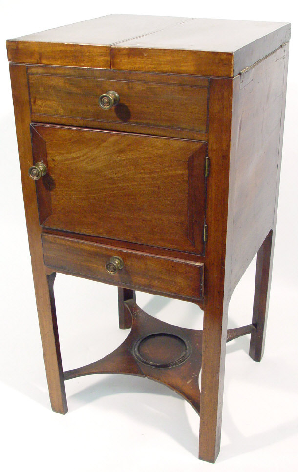 Appraisal: th century mahogany washstand the hinged lid above a false