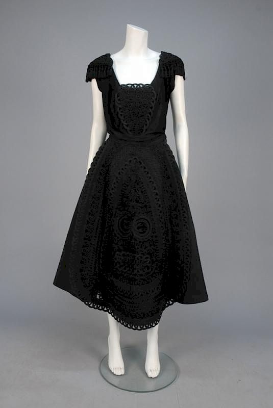 Appraisal: CARRIE MUNN SILK AFTERNOON ENSEMBLE c Black jersey sleeveless bodice