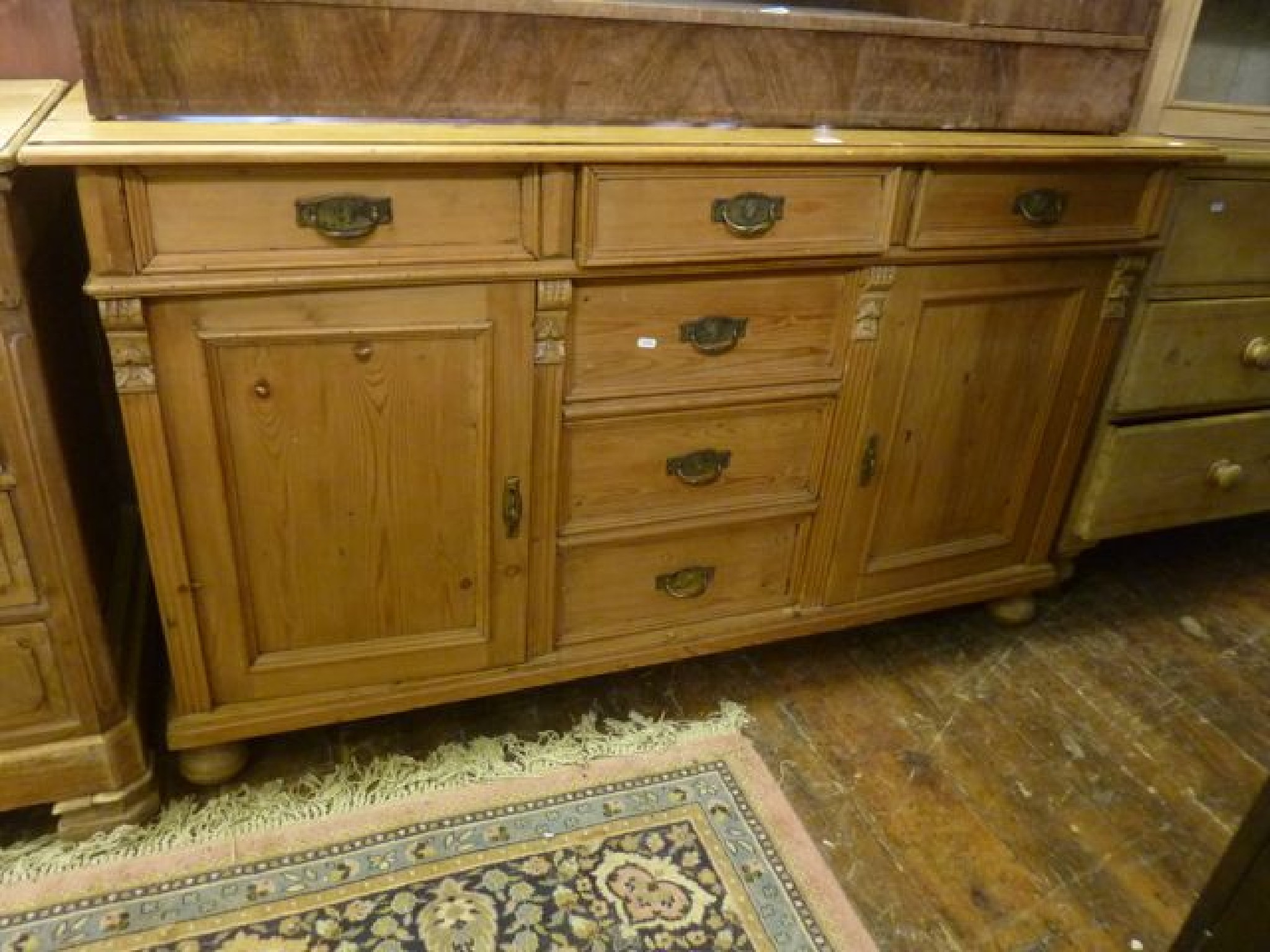 Appraisal: A th century stripped and waxed pine dresser base fitted