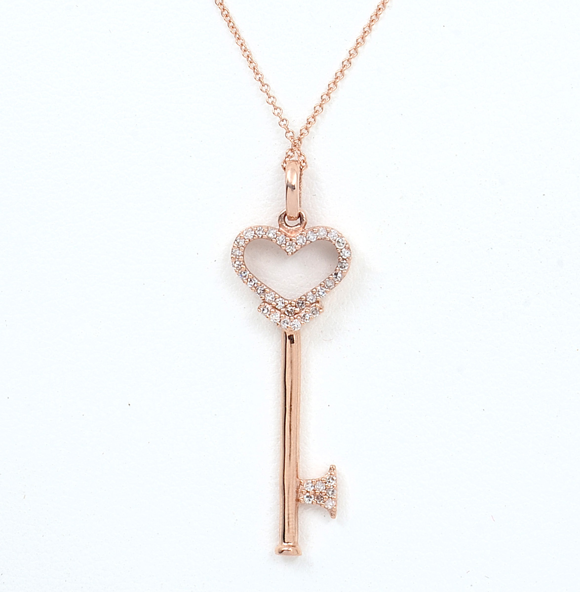 Appraisal: EFFY ROSE GOLD HEART KEY PENDANT CHAIN Pave set diamonds