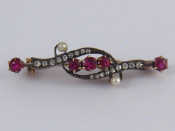 Appraisal: A boxed antique ruby diamond and seed pearl brooch approx