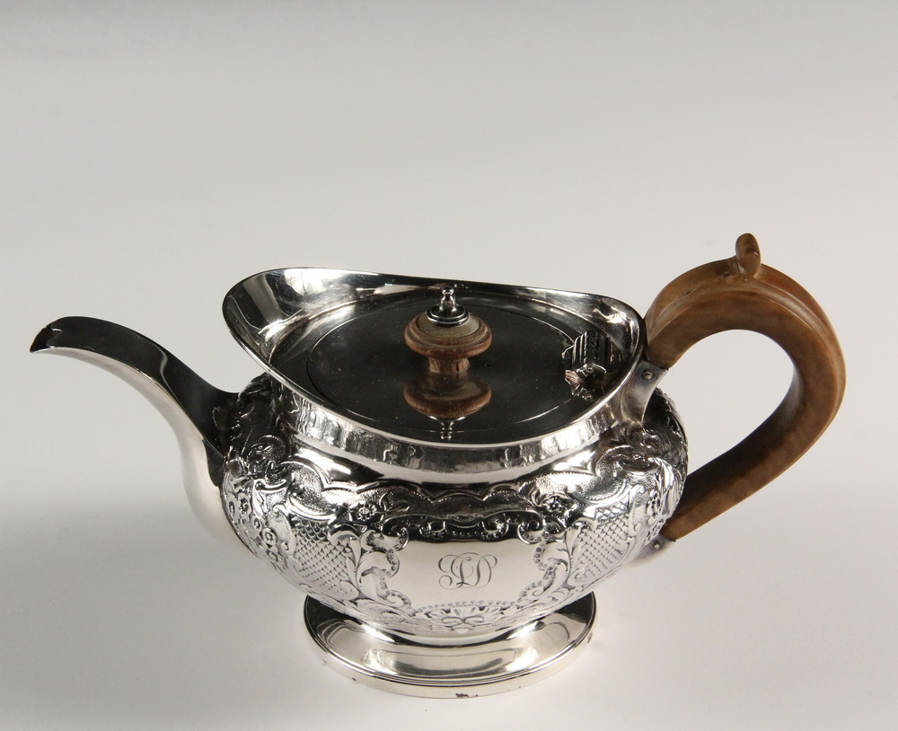 Appraisal: TEAPOT - English Sterling Silver Teapot with repousse floral and