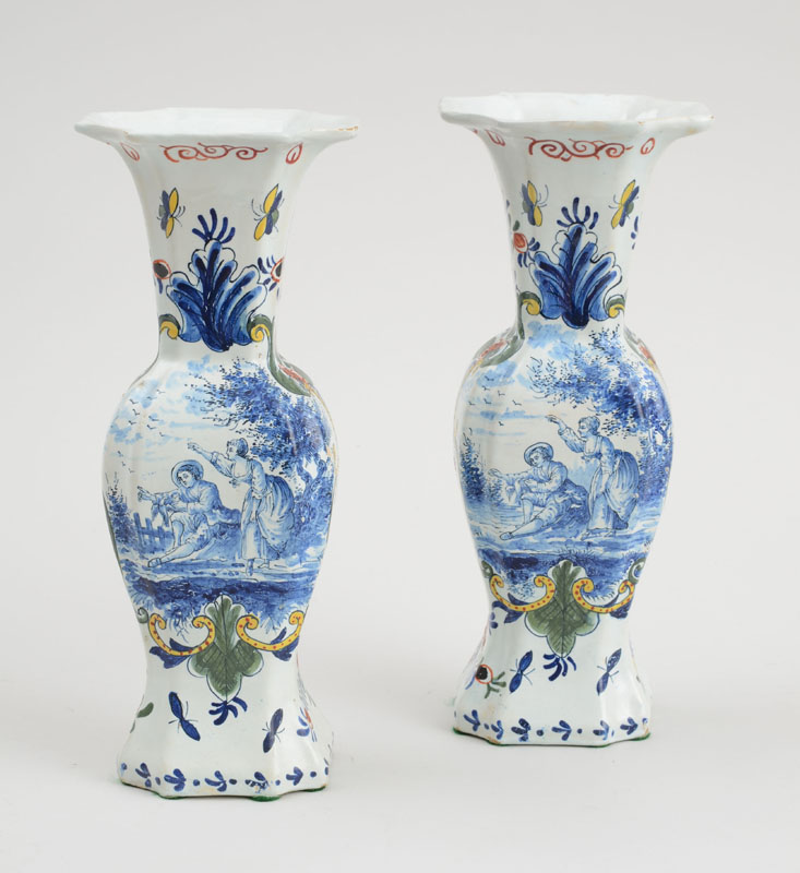 Appraisal: PAIR OF DUTCH POLYCHROME DELFT ABGULAR BALUSTER-FORM VASES Each with