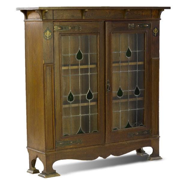 Appraisal: ENGLISH ARTS CRAFTSBookcase with inlaid leaded-glass doors x x