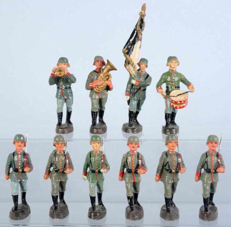 Appraisal: Elastolin cm German Army Parade Large size composition soldiers containing