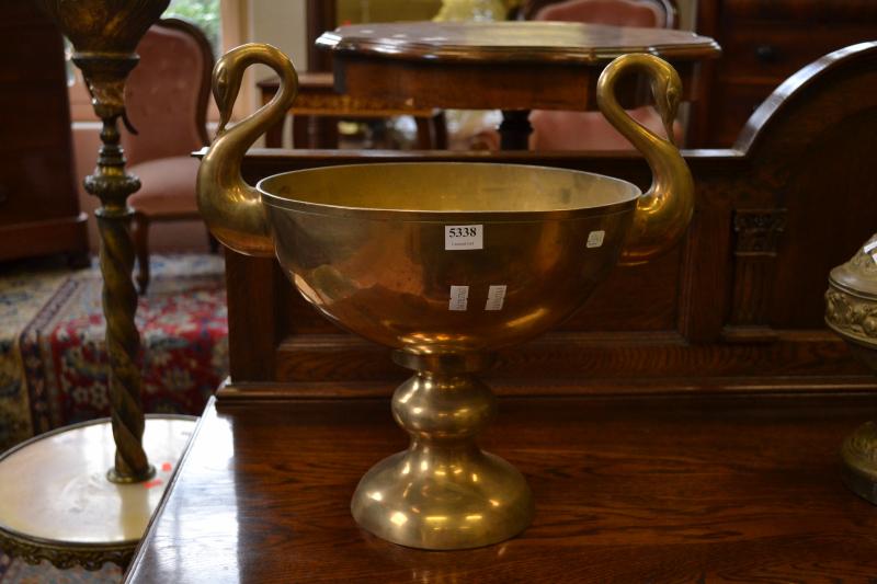 Appraisal: A BRASS CENTREPIECE WITH SWAN HANDLES A BRASS CENTREPIECE WITH