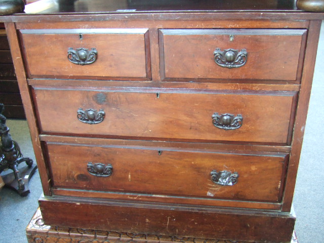 Appraisal: A Victorian mahogany chest of two short and two long