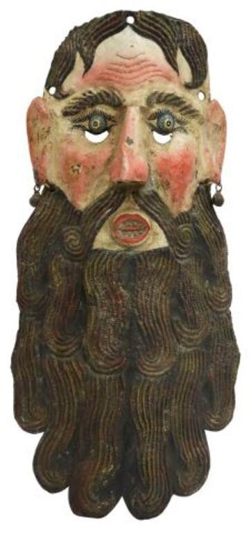 Appraisal: Large painted metal mask Mexico depicting bearded man with bell