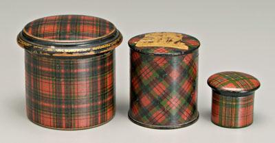 Appraisal: Three tartanware lidded boxes all cylindrical one Caledonia tartan -