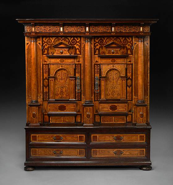 Appraisal: A Continental Baroque marquetry inlaid cupboard early th century The