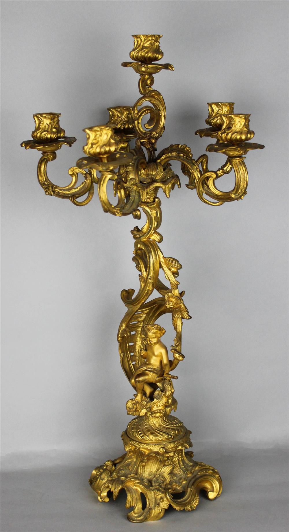 Appraisal: LOUIS XV STYLE GILT-BRONZE CANDELABRA late th C cast as