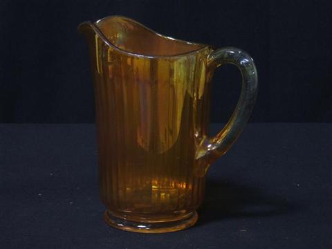 Appraisal: ORANGE DEPRESSION GLASS PITCHER h in