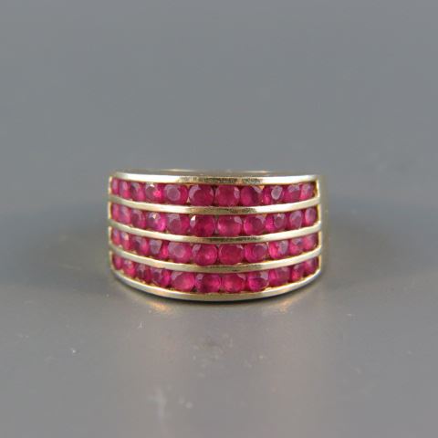 Appraisal: Ruby Ring four rows of round gems in K yellow