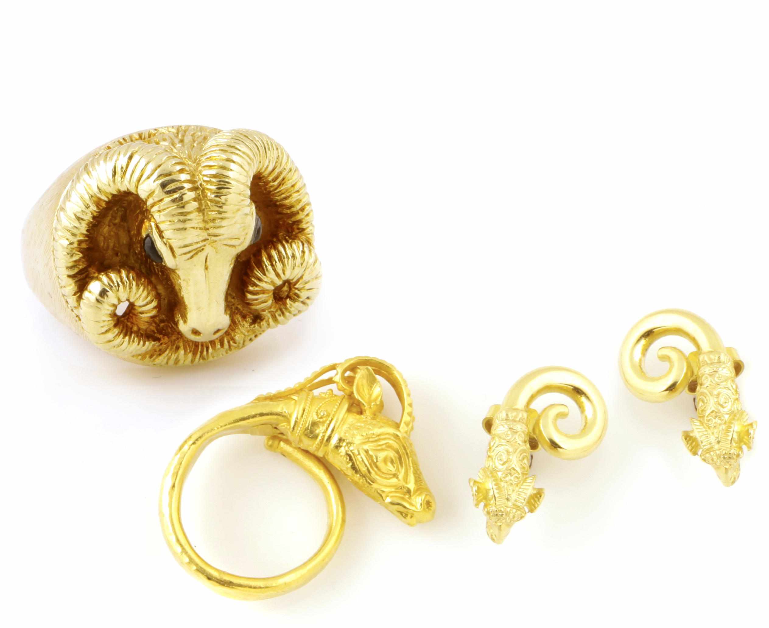 Appraisal: A group of gold ram's head jewelry comprising two rings