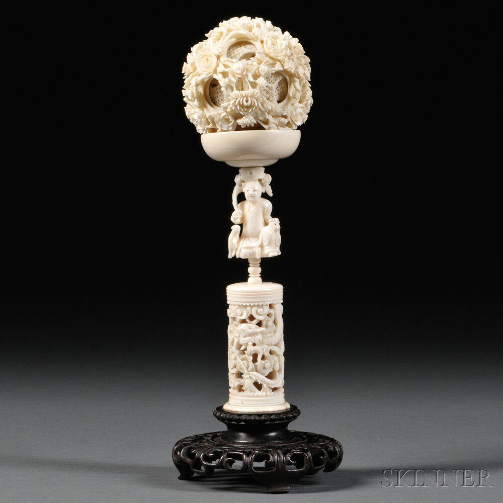 Appraisal: Ivory Puzzle Ball and Stand China th century the ball