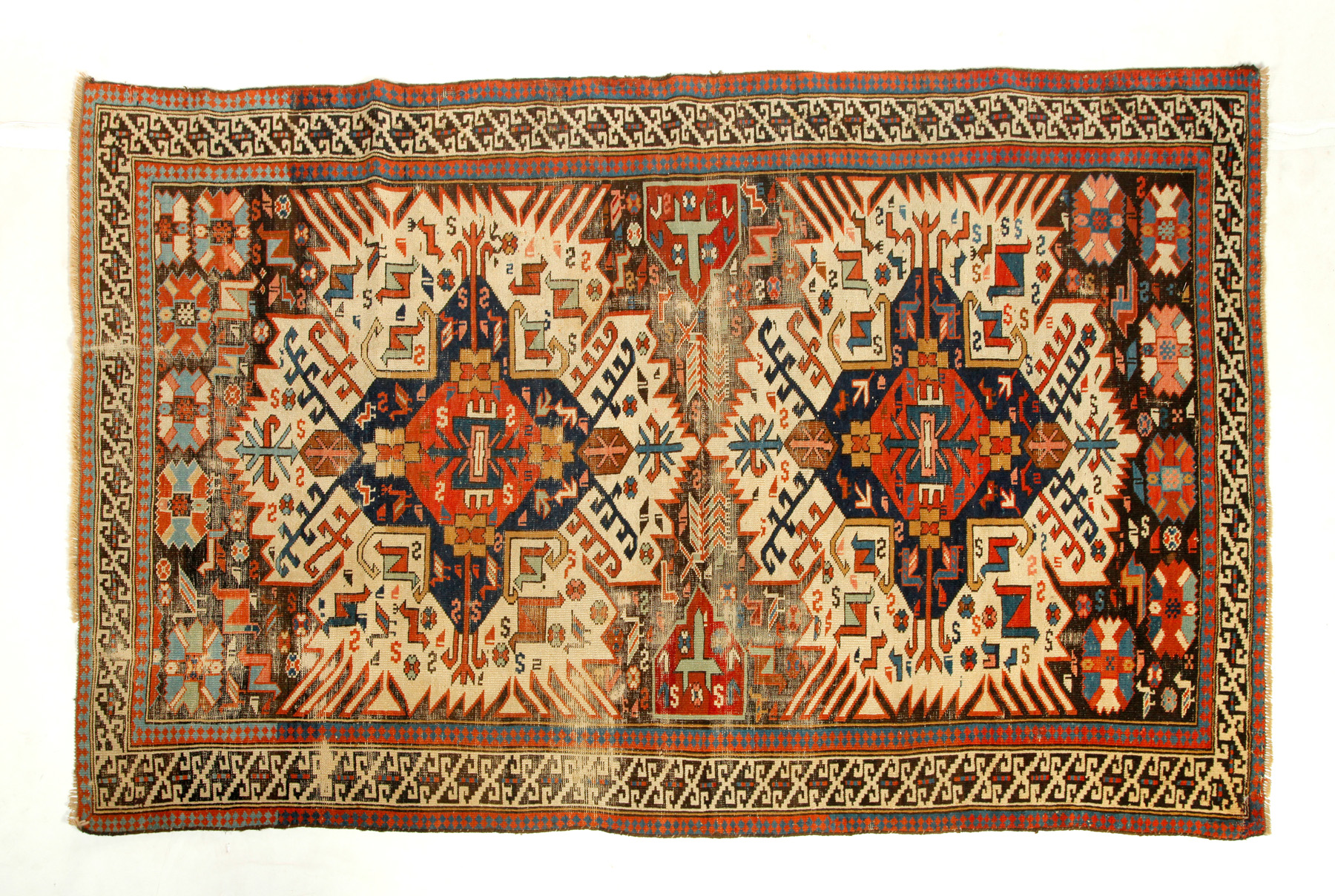 Appraisal: ORIENTAL RUG Ca Zejwa Kuba with ivory ground ' x