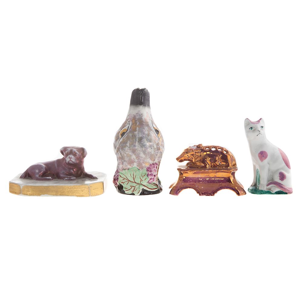 Appraisal: Four English Lustre Ware Animals including pink lustre hedgehog flower