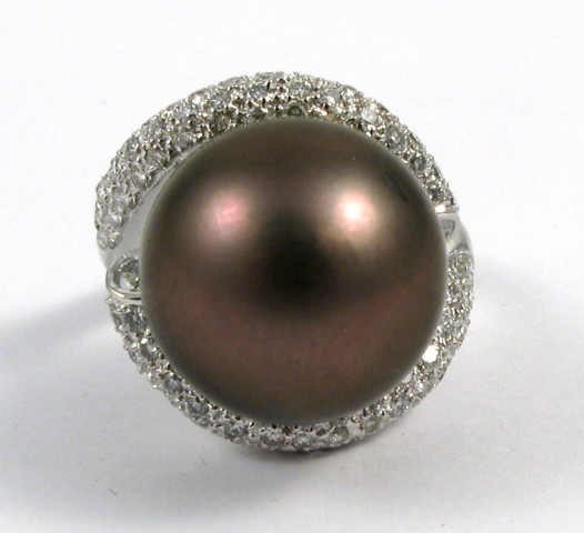 Appraisal: BLACK PEARL DIAMOND AND WHITE GOLD RING The top half