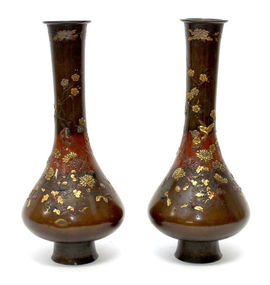 Appraisal: A pair of Japanese bronze bottle vases Meiji period inlaid