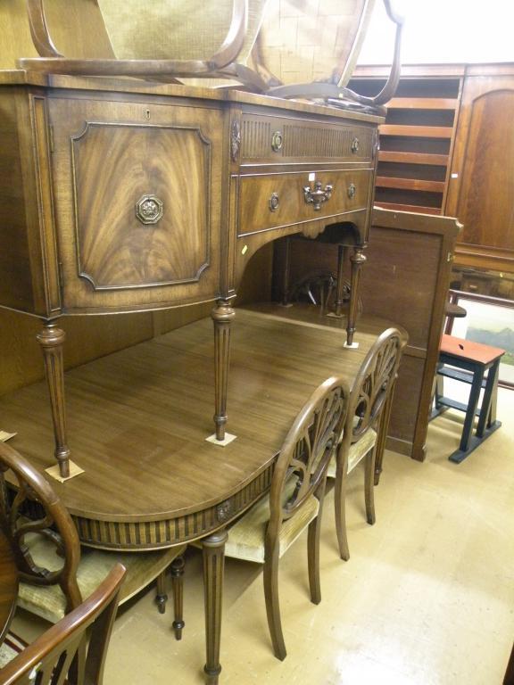 Appraisal: A mahogany dining room suite in George III style comprising