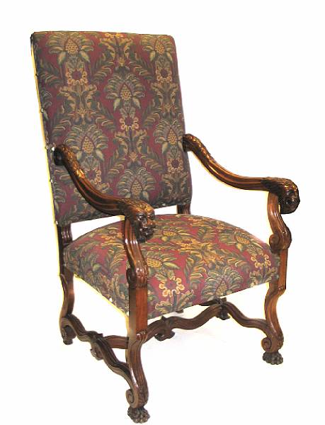 Appraisal: A Continental Baroque style carved walnut armchair height in width